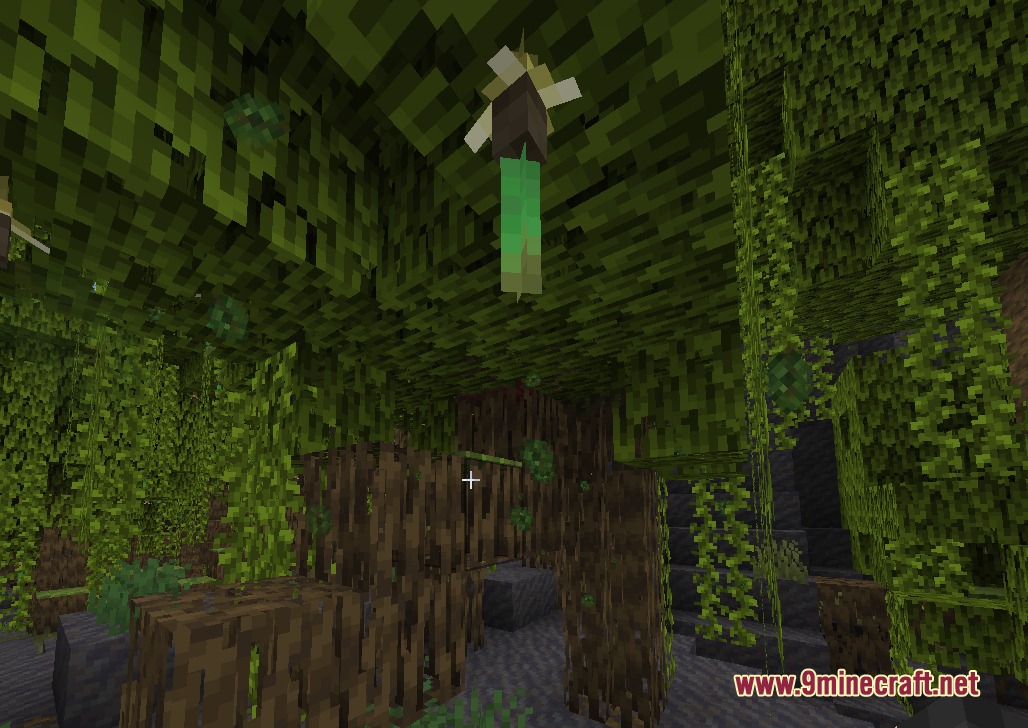 Sylvan Drift Mod Screenshot 2 Spore blossom hanging from the ceiling with falling green particles in a cave