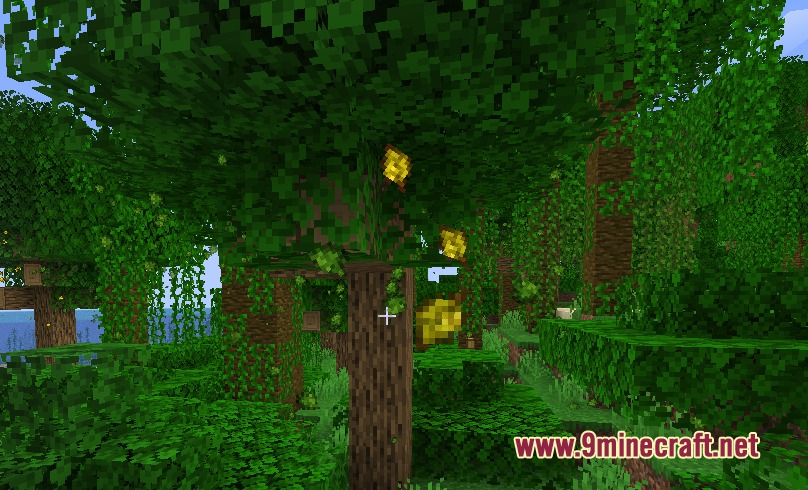 Sylvan Drift Mod Screenshot 4 Yellow leaf particles falling from a jungle tree canopy in a lush forest