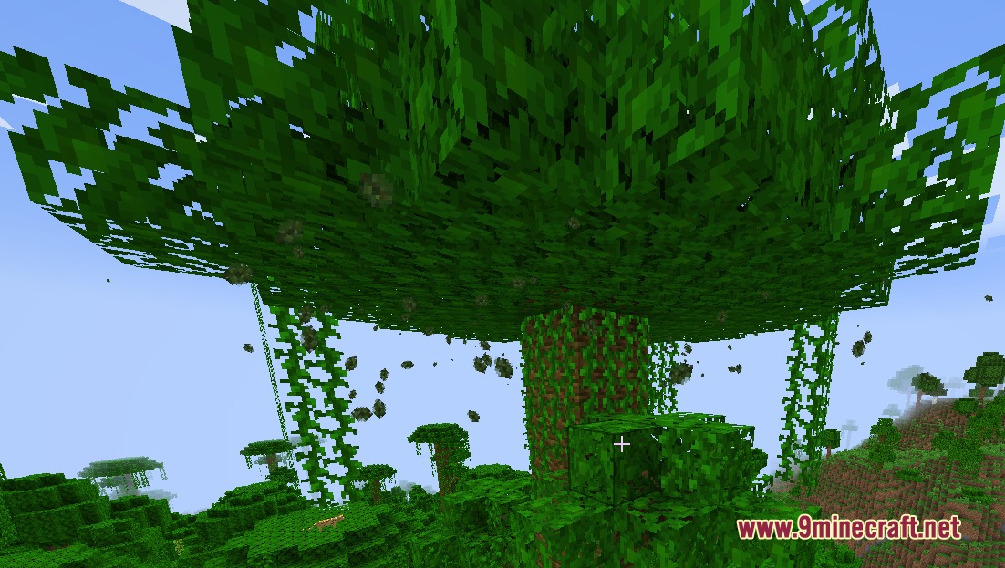 Sylvan Drift Mod Screenshot 5 Green leaf particles falling from a large jungle tree canopy in Minecraft