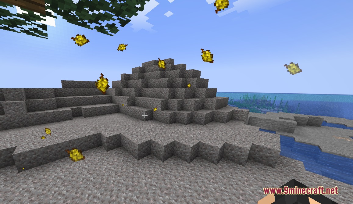 Sylvan Drift Mod Screenshot 6 Yellow leaf particles drifting onto a gravel beach beside the blue ocean