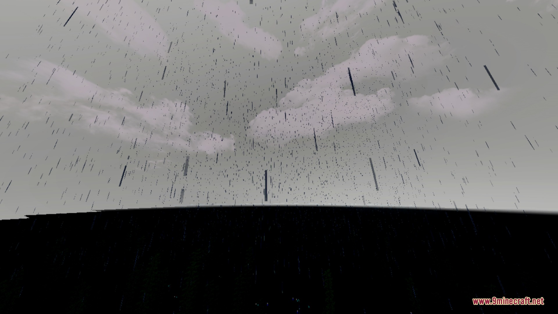 Rain falling from a cloudy grey sky over the dark ocean horizon