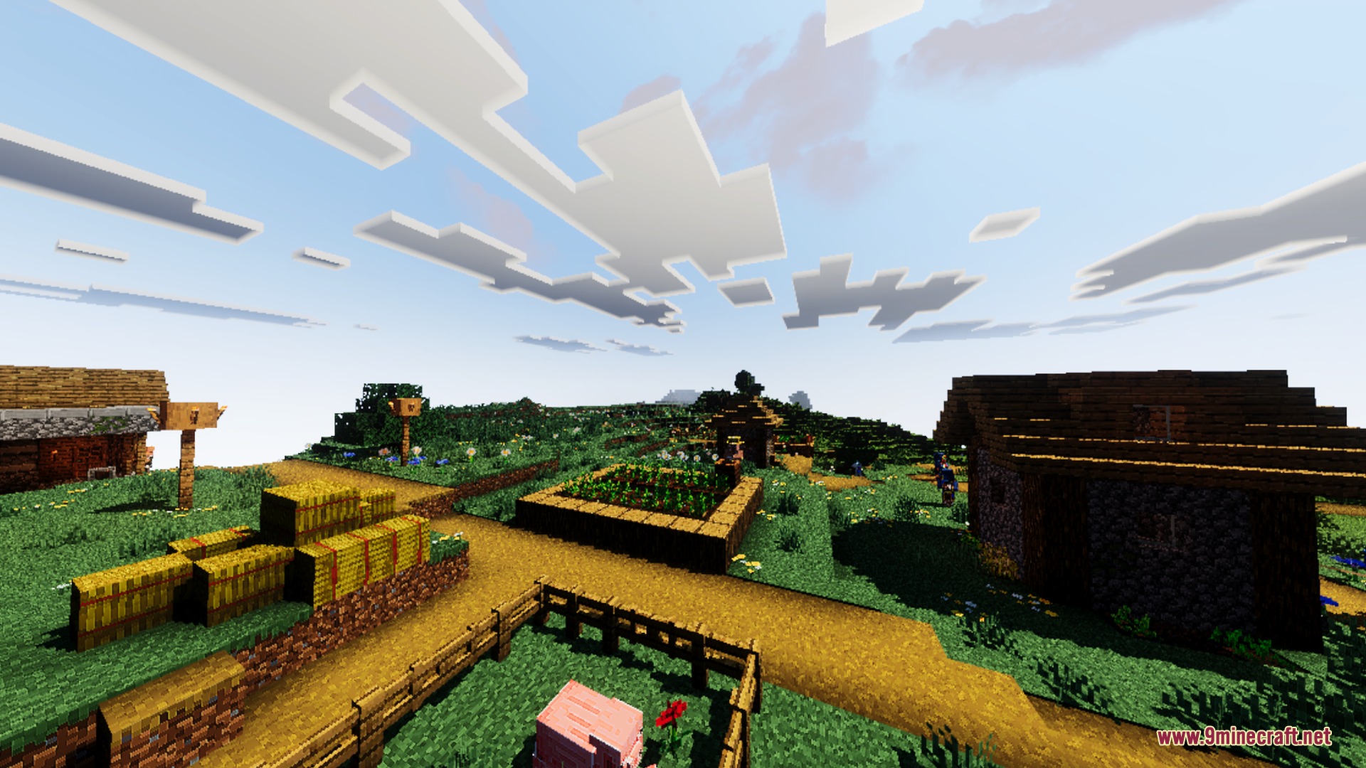 Improved lighting illuminates a village with hay bales and a pig in a pen