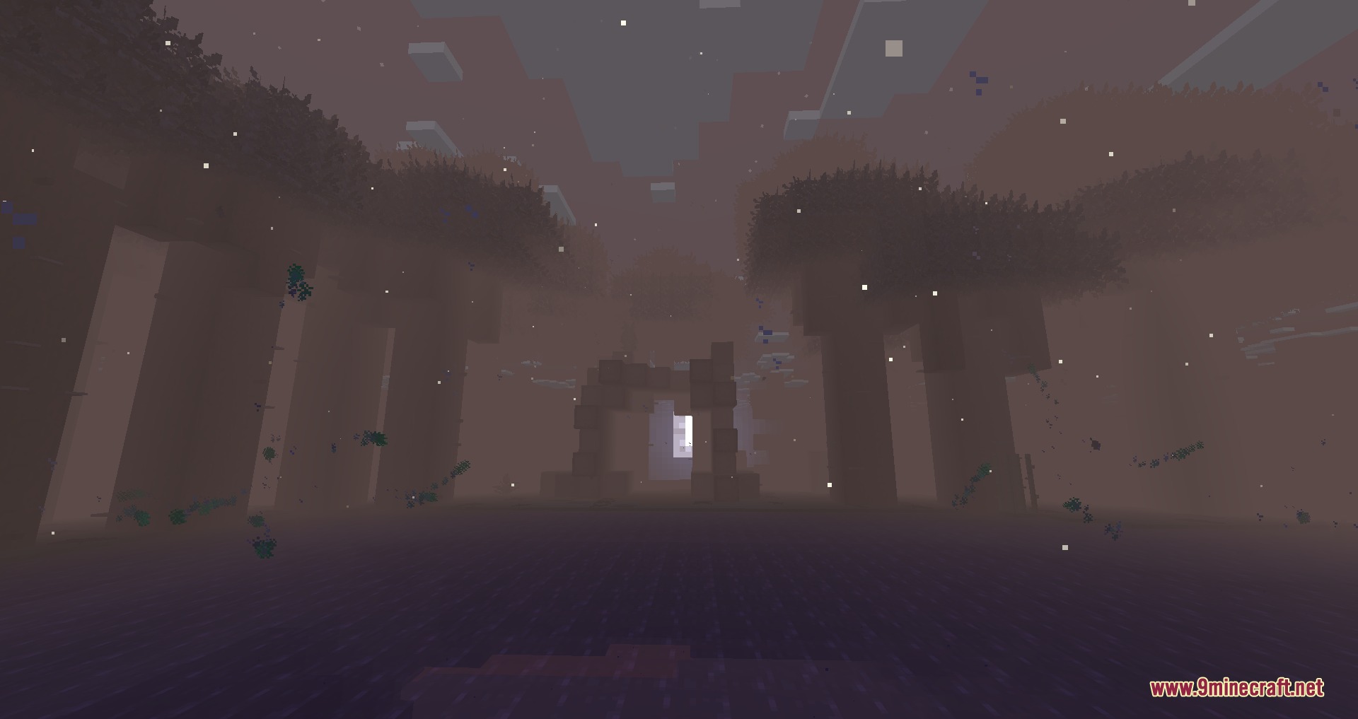 Tainted Timber Trails Mod Screenshot 6 A stone archway stands in the distance within a thick foggy forest biome