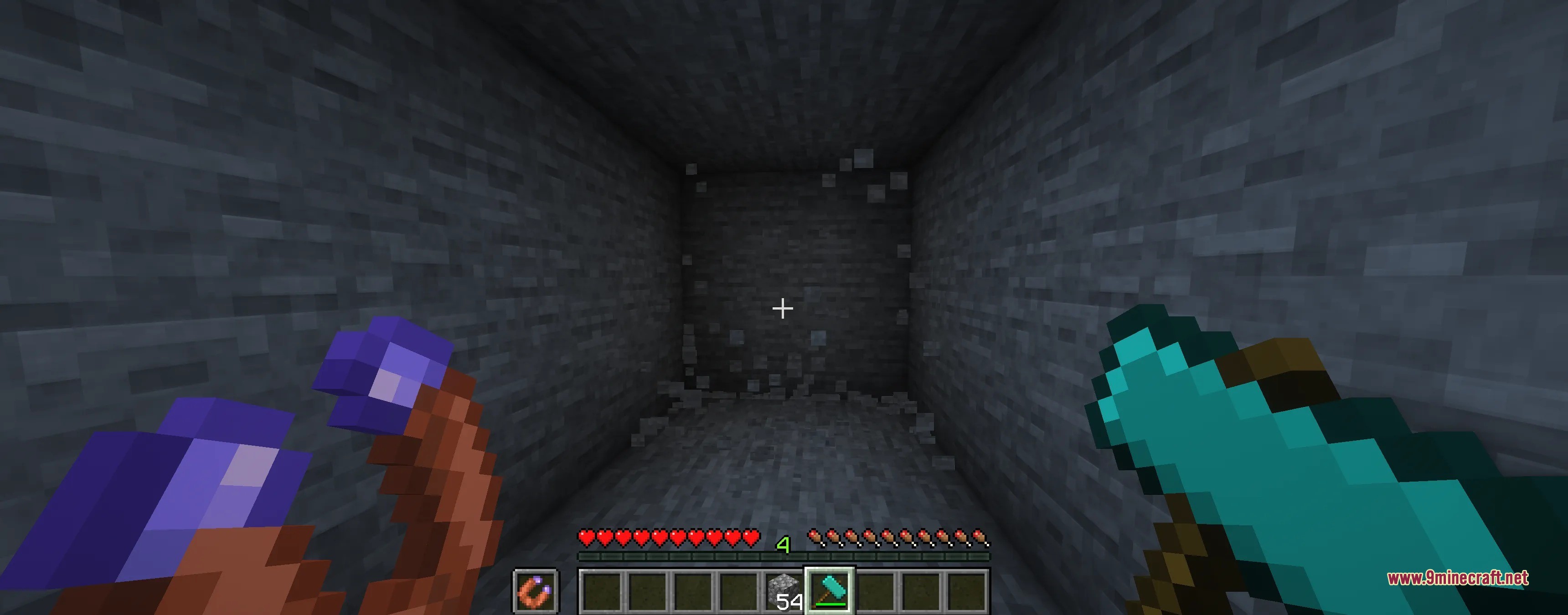 Tectonic Widebore Data Pack Screenshot 5 Player holding a diamond hammer and magnet while mining in a stone cave