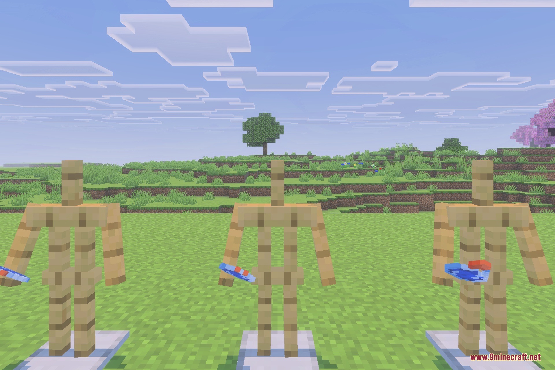Tools & Potions Reimagined Texture Pack Screenshot 3 Three armor stands holding custom potion bottles in a wide green field