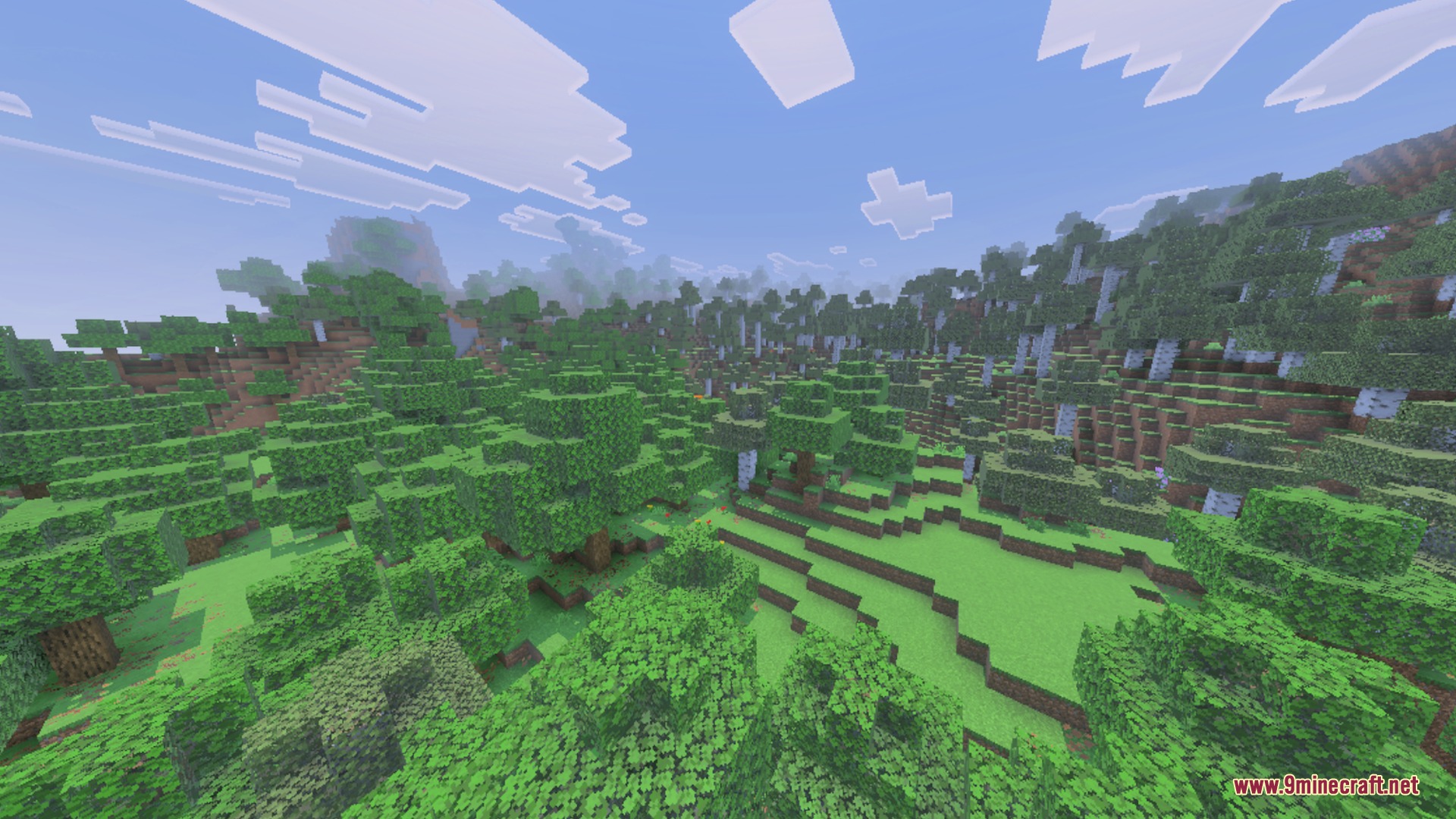Lush green hills and trees under a bright sky with soft horizon lighting