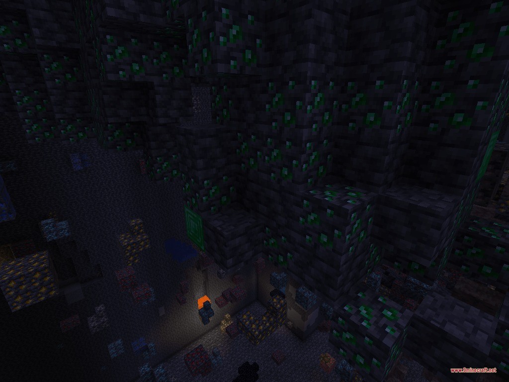 Universal Bedrock Deposits Data Pack Screenshot 1 Large clusters of emerald ore embedded in deepslate blocks within a dark cave