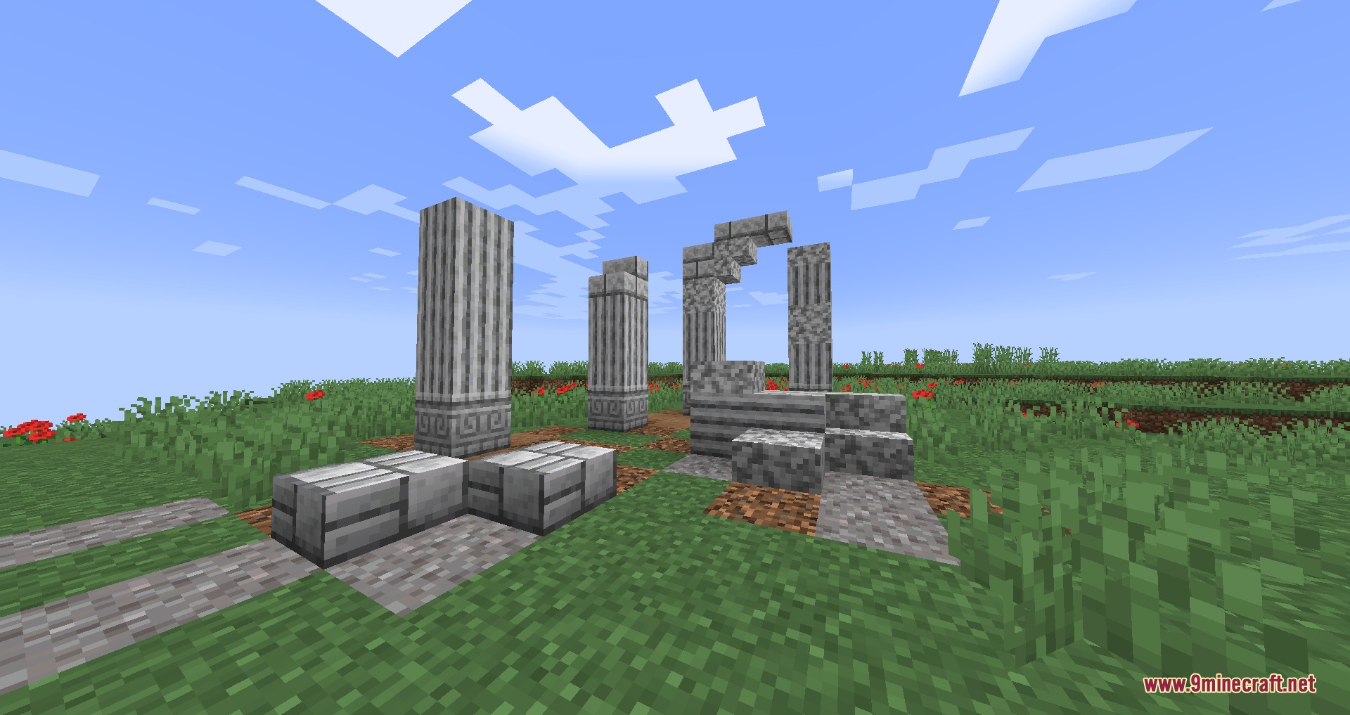 Universal Masonry Spectrum Mod Screenshot 5 Various decorative stone pillars and bricks placed in an open field