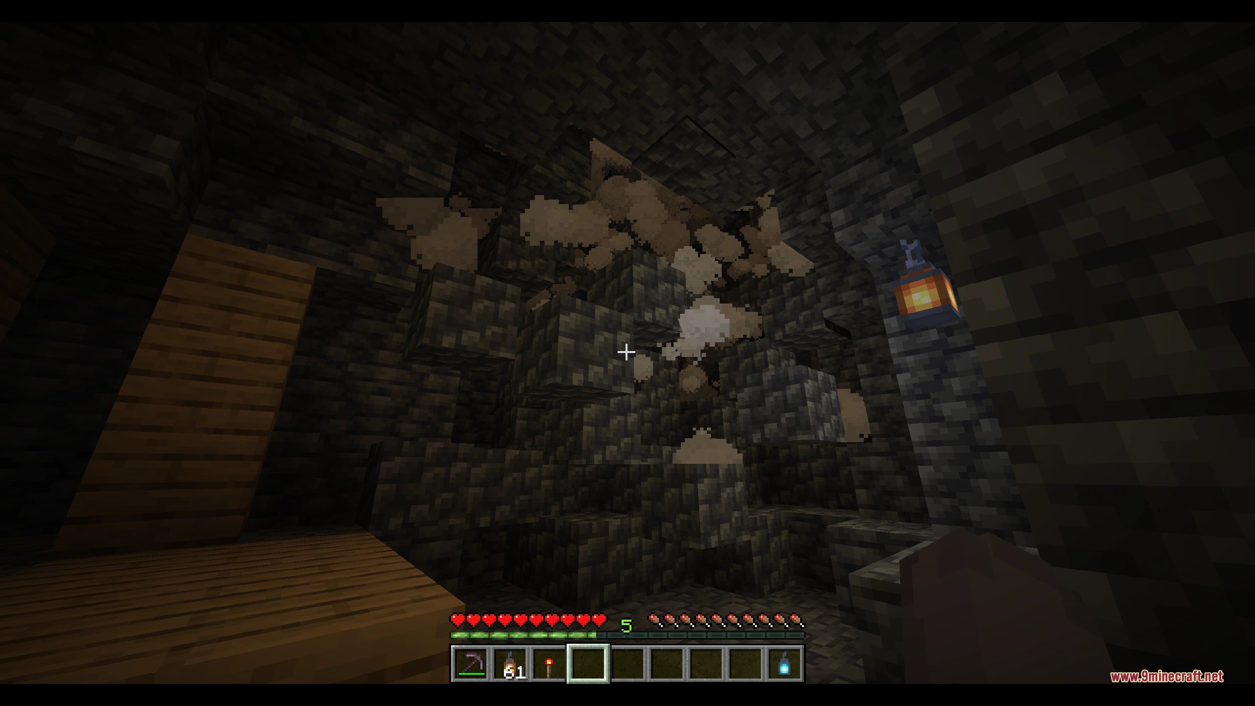 Dangerous rockfall physics causing a ceiling collapse inside a dark underground cave