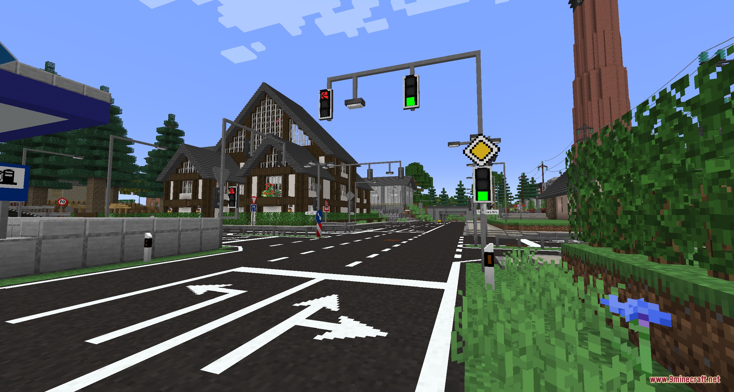 Urban Asphalt Grid Mod Screenshot 1 Modern Minecraft city street with asphalt roads and functional traffic light signals