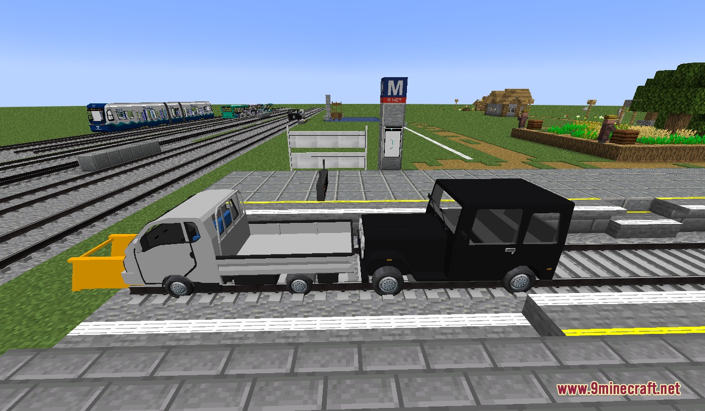 Urban Transit Fleet Resource Pack Screenshot 5 A white utility truck and black taxi parked on a railway track platform