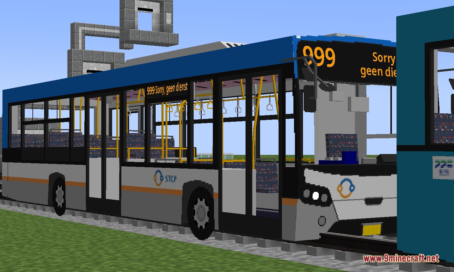 Urban Transit Fleet Resource Pack Screenshot 6 A blue and white city bus with STCP livery parked on a railway track