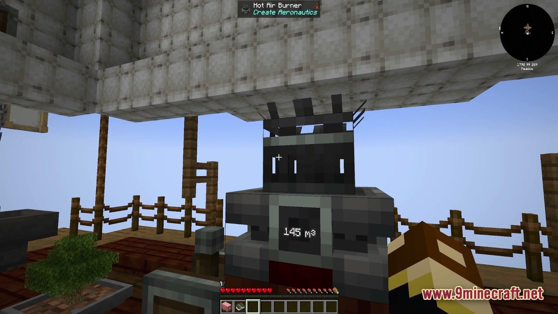 Vessel of the Void Modpack Screenshot 3 A Hot Air Burner machine from Create Aeronautics placed on a wooden airship deck