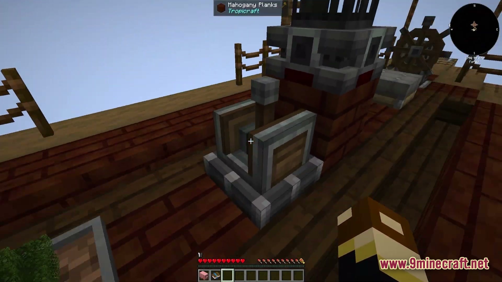 Vessel of the Void Modpack Screenshot 5 A mechanical lever and steering wheel on a wooden ship deck made of mahogany planks