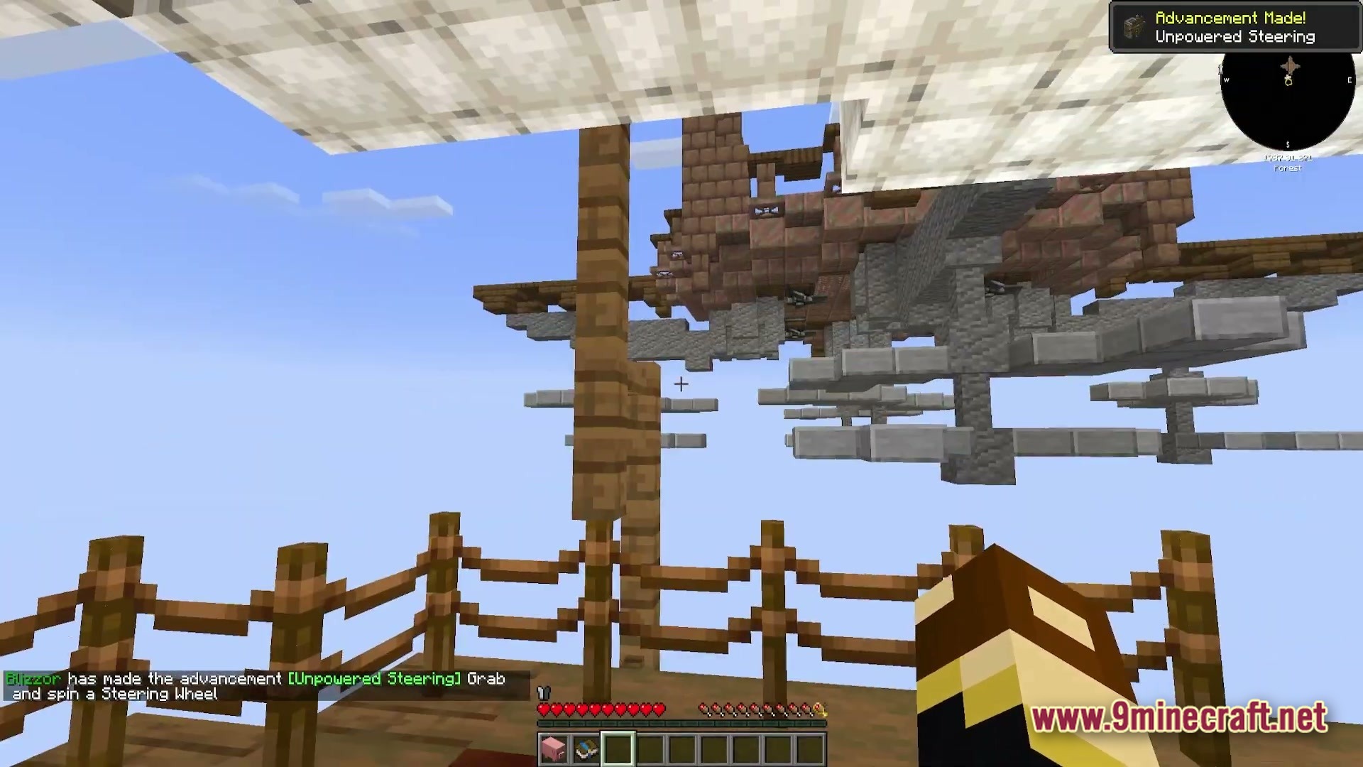 Vessel of the Void Modpack Screenshot 6 A player stands on a wooden deck overlooking a large floating airship structure in the sky