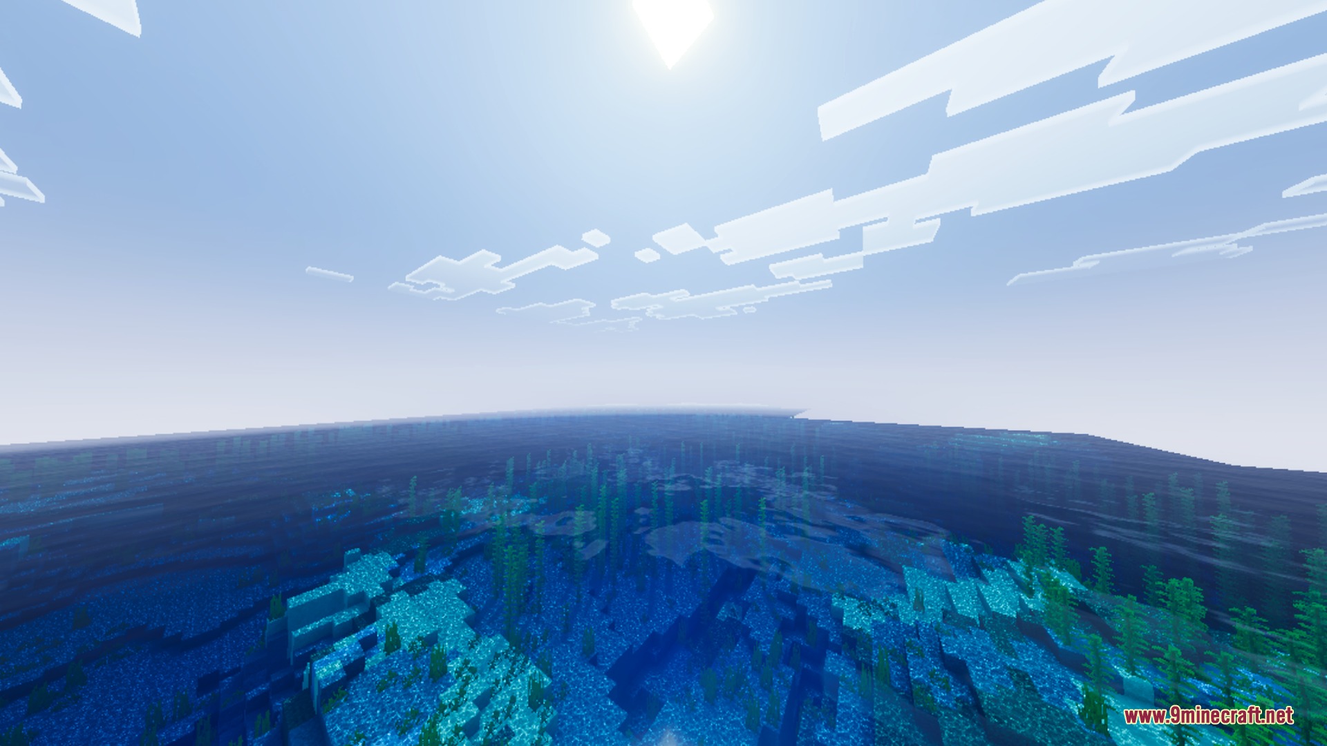 Vibrant Legacy L Espace Shader Screenshot 1 A vast blue ocean with clear water and kelp under a bright sun