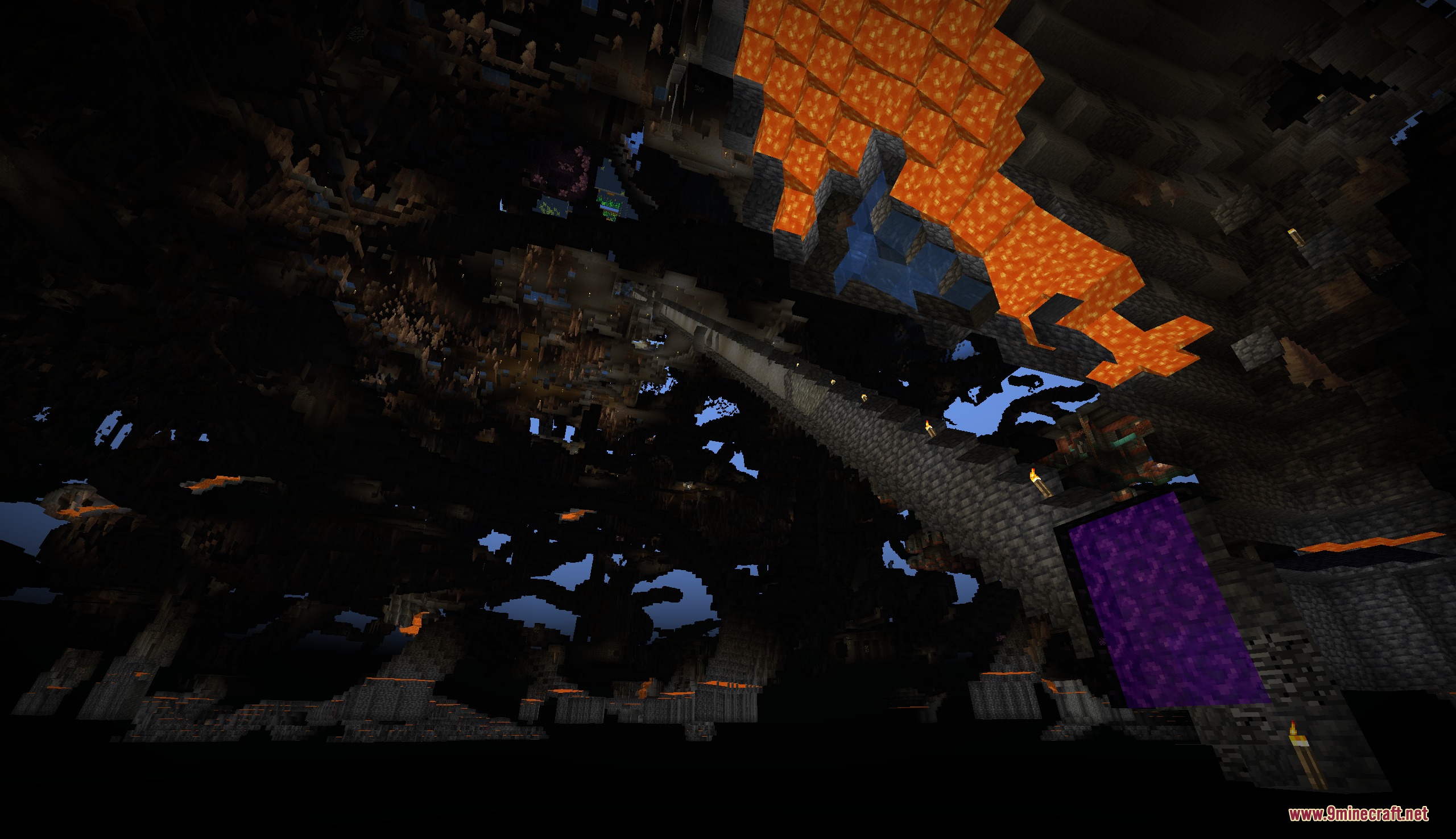 Voidbound Resolve Mod Screenshot 5 An expansive underground cavern featuring a Nether portal and a long stone bridge