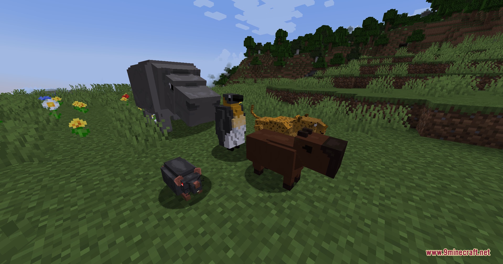 Wild Tome Chronicles Mod Screenshot 4 Diverse wildlife from Wild Tome Chronicles Mod standing together in a grassy biome