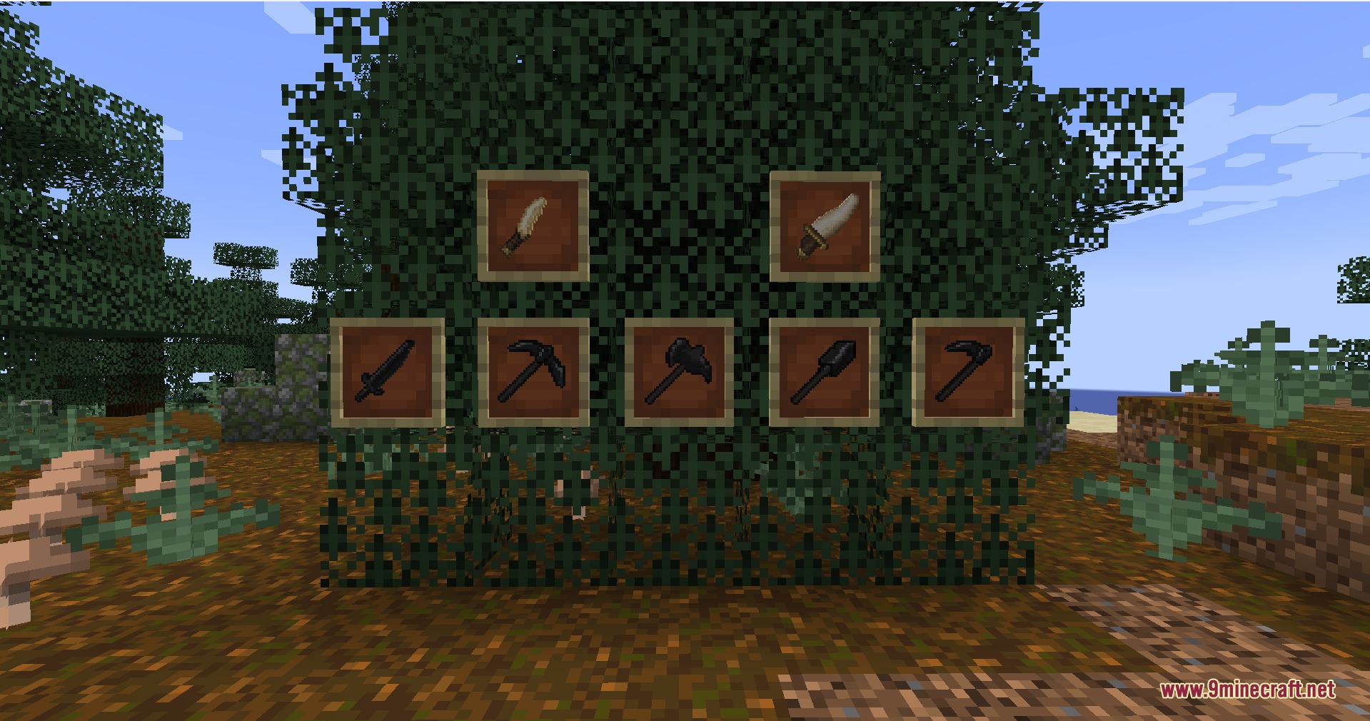 Wild Tome Chronicles Mod Screenshot 5 Custom tools and weapons from Wild Tome Chronicles displayed on leaves