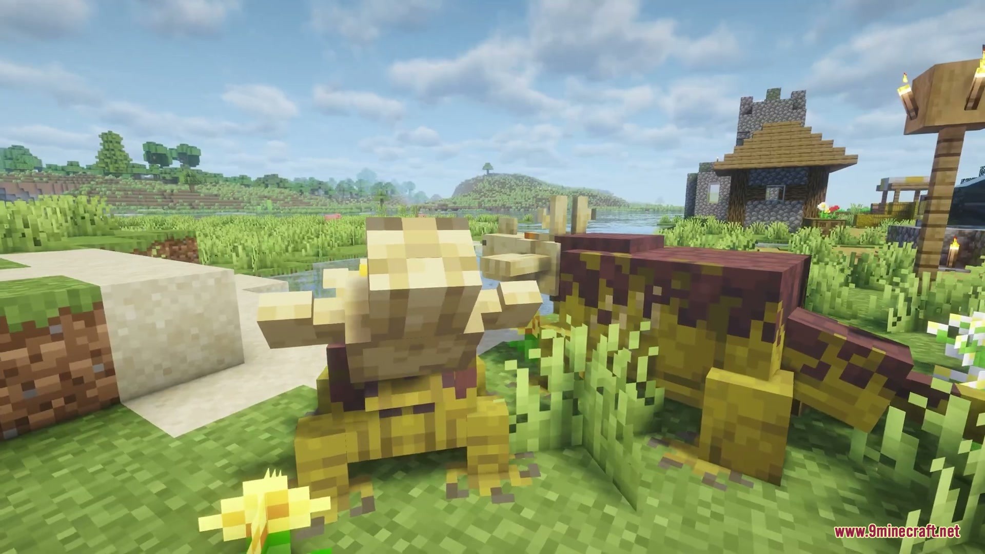 Wilderbound Frontiers Mod Screenshot 4 A yellow prehistoric creature standing in a grassy field near a village