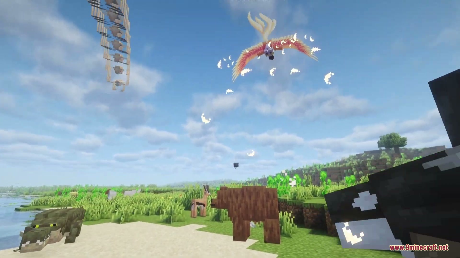 Wildlands Bestiary Renascent Mod Screenshot 1 A majestic phoenix flies above a bear and crocodile in a lush environment