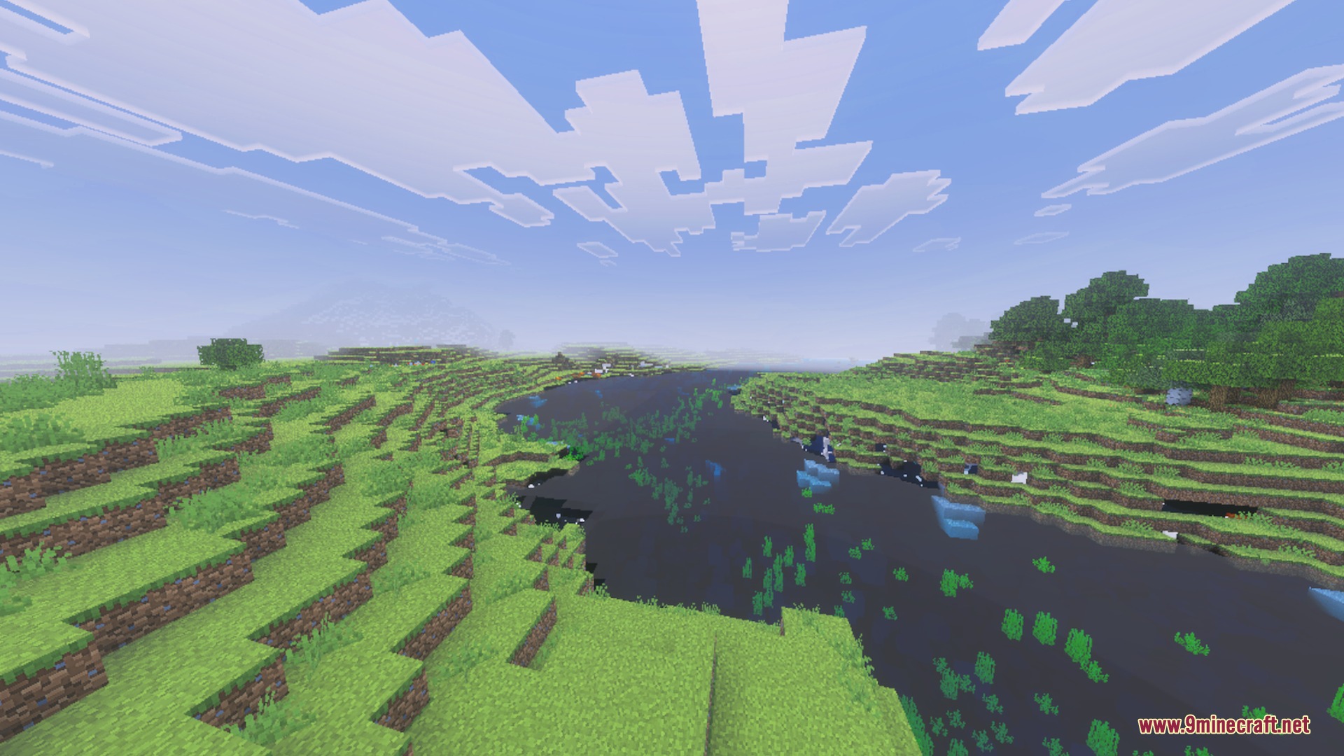 X-ray+better Shader Screenshot 5 A vast Minecraft landscape featuring a winding river and rolling green hills