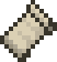 A small, light-colored paper item.
