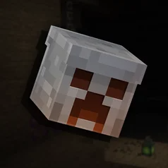 Creeper head on a white block