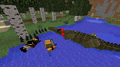 Player swimming near a large crocodile