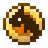 A golden, pixelated, circular item with a dark center.