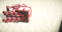 Red and white mushroom blocks on ground