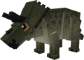 A green, blocky creature with an eye
