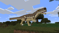 A brown dinosaur mob in a field.