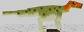 Small green dinosaur with orange head