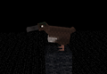 A small, dark brown bird-like mob.