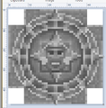 A gray circular block with a face.