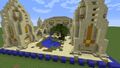 Large desert-themed structure with water feature