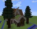 A large, detailed house with trees.