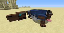 A large blue and brown mob with a small brown mob.