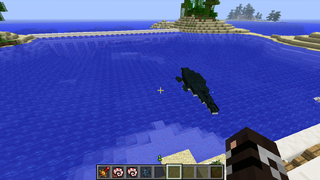 A large aquatic mob swimming in water.