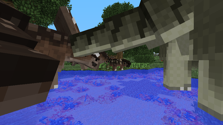 Large dinosaurs near water in forest