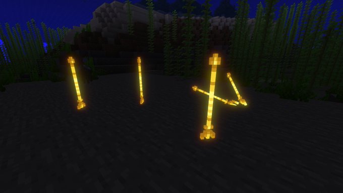 Glowing golden rods on ocean floor