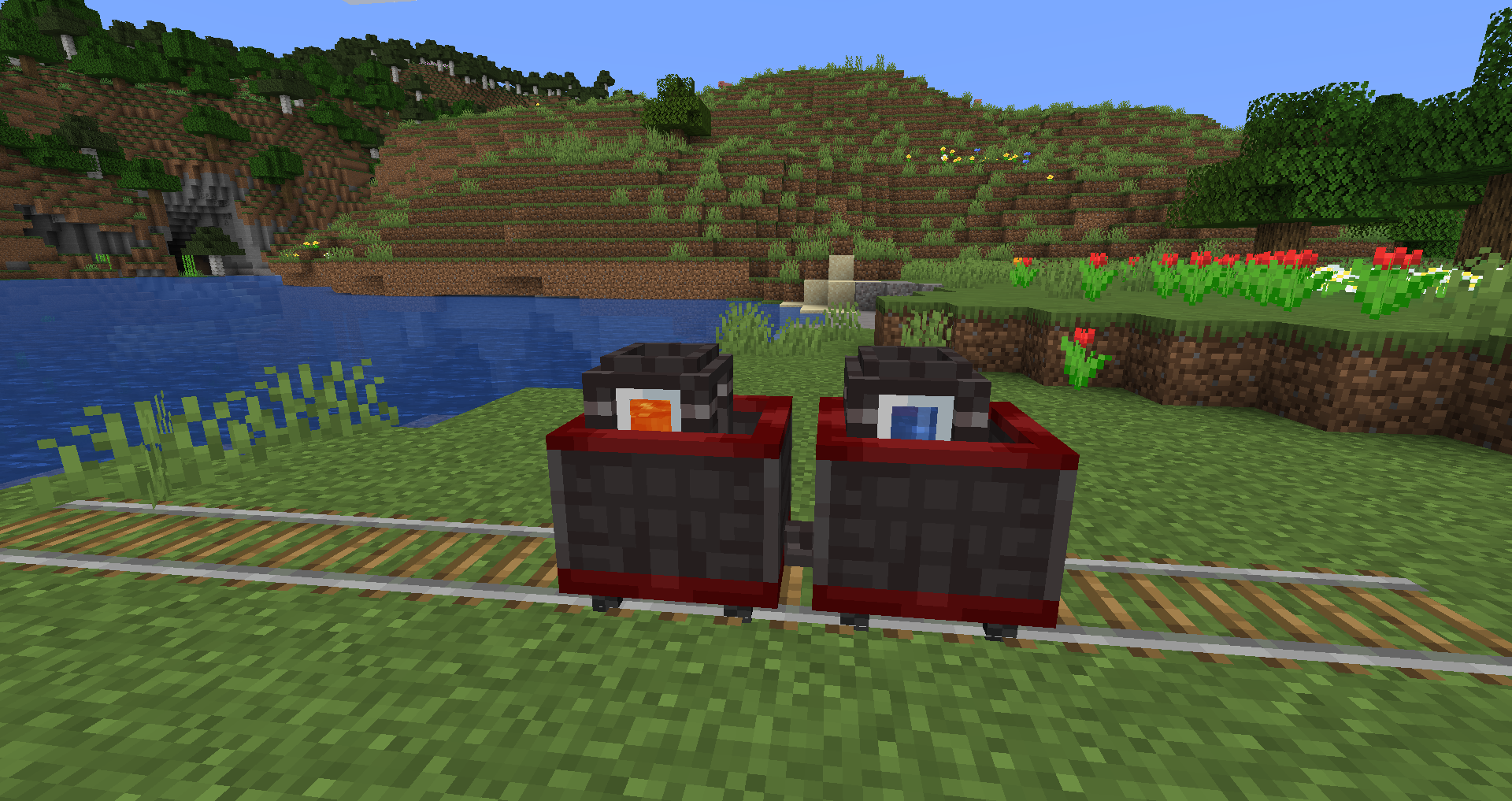 Two penguins in minecarts on tracks