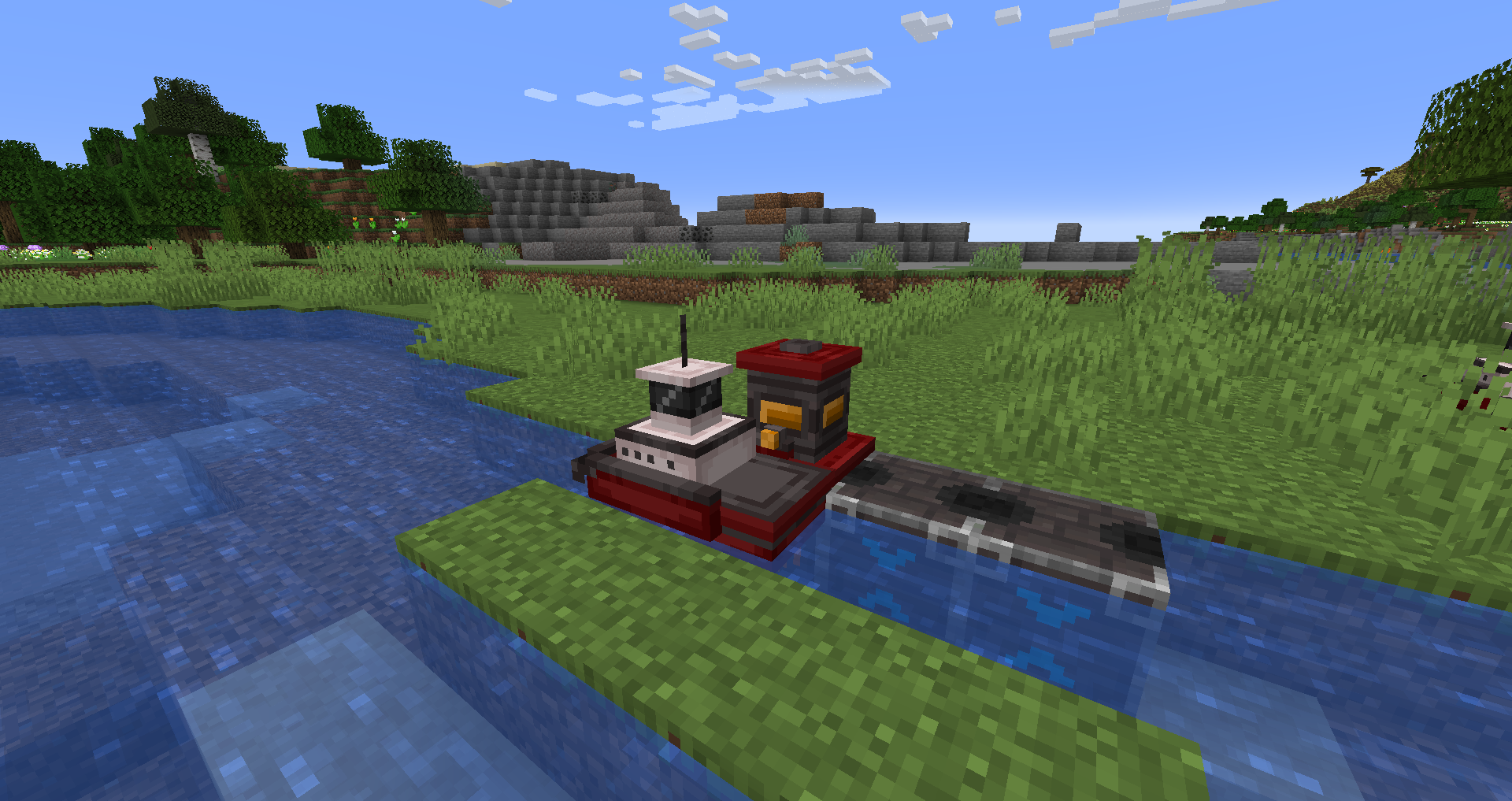 Tugboat pulling a barge on water