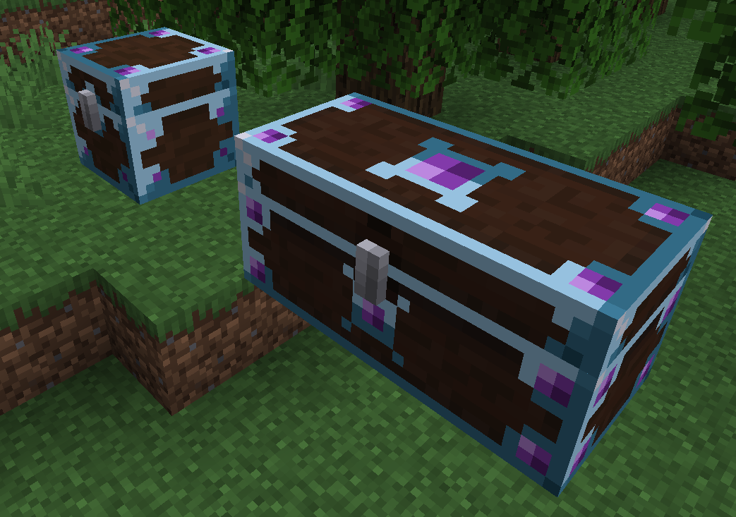 Two enchanted chests on grass