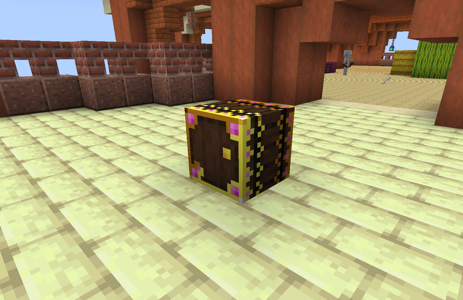 A brown block with gold and pink trim