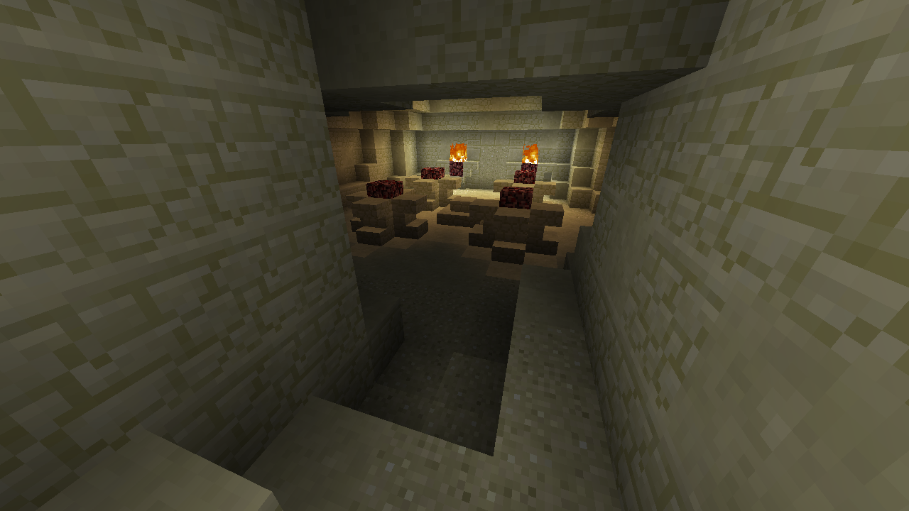 Desert temple interior with lit torches