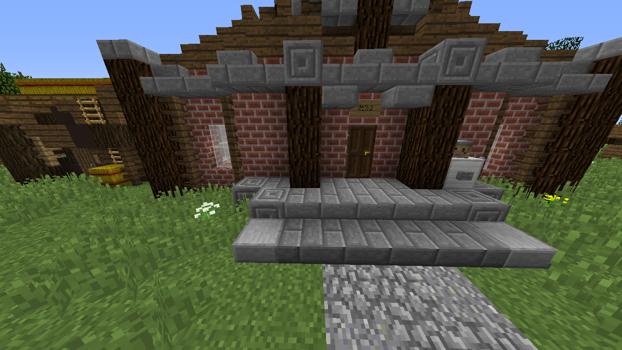 Stone path leading to a brick building