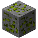 Stone block with green ore veins