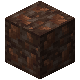 A dark, rusty metal block texture.